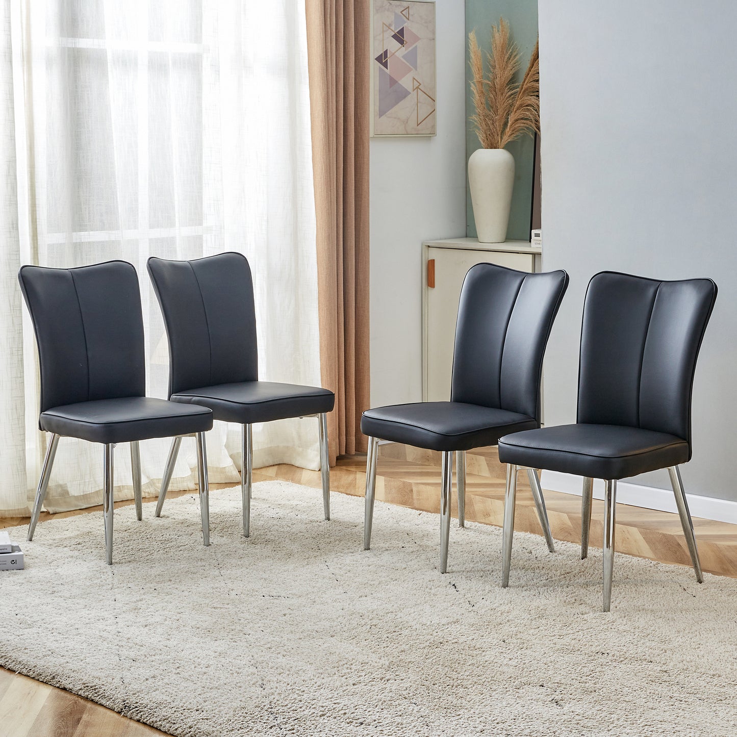 Phelps Modern minimalist dining chairs in Black. (Set of 4)